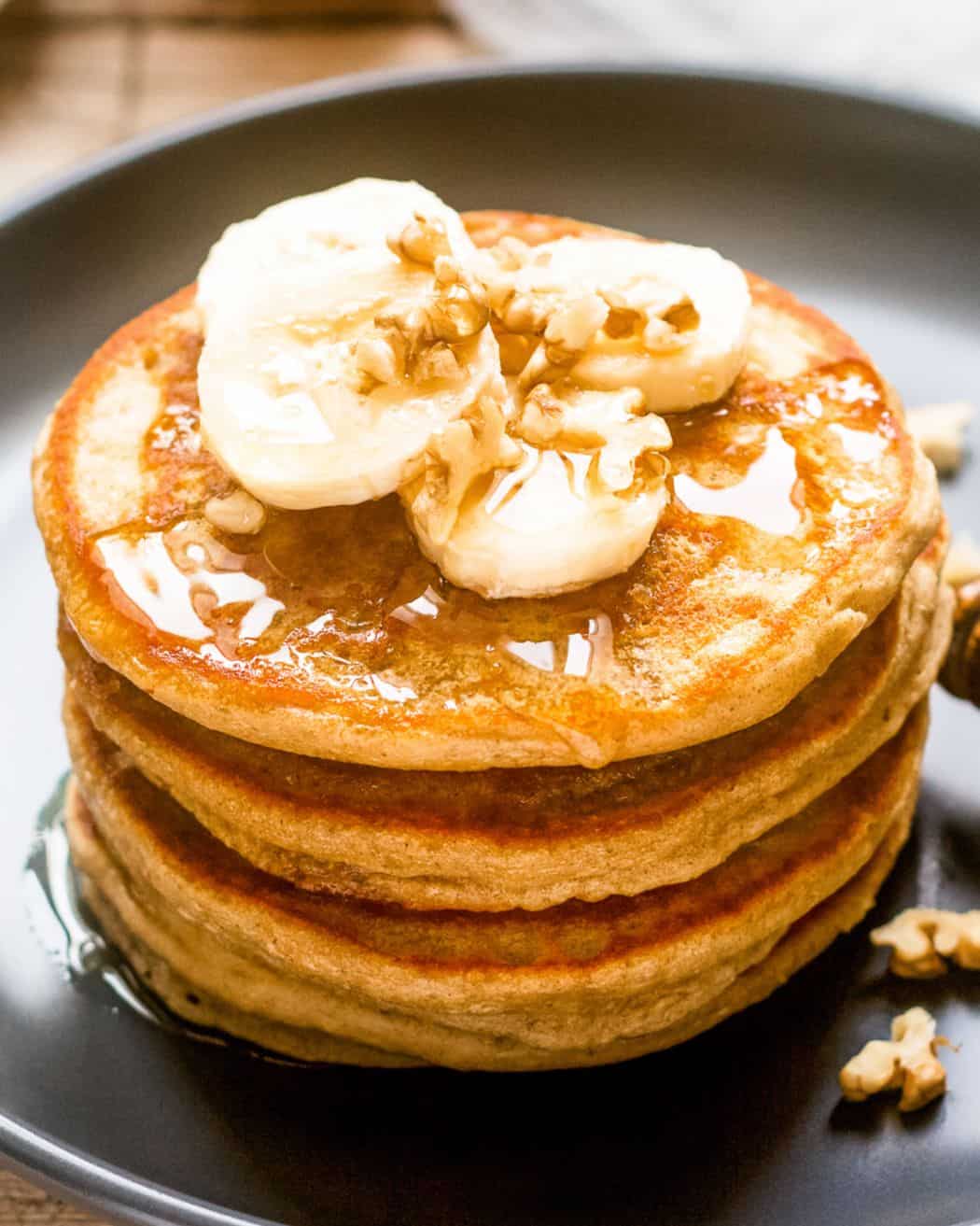 A stack of banana pumpkin pancakes on a plate