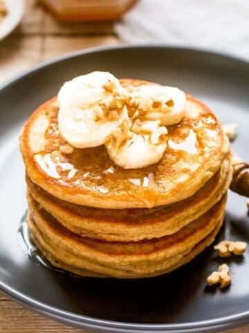 A stack of banana pumpkin pancakes on a plate