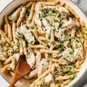 large skillet of creamy chicken pasta