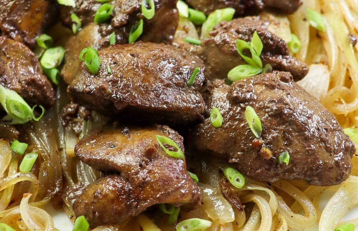 sauteéd chicken livers over a bed of cooked onions