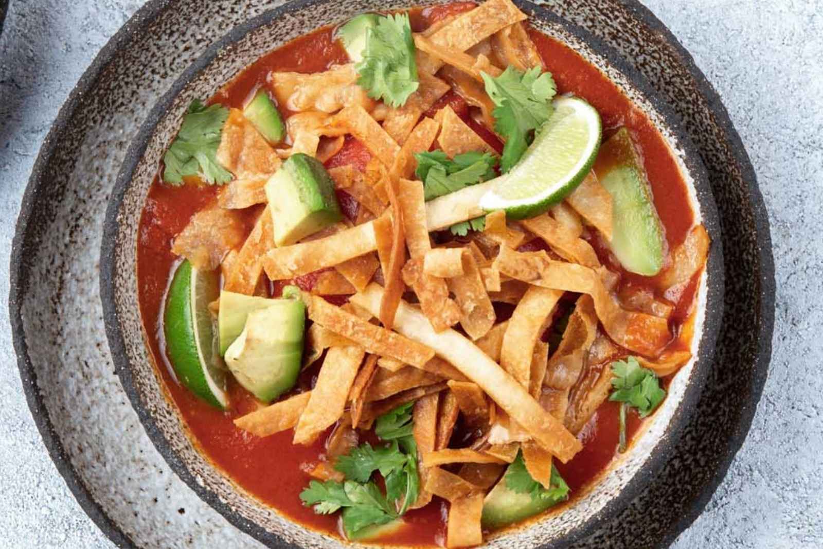 a bowl of veggie tortilla soup