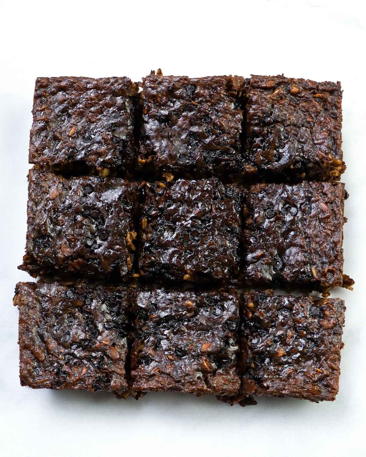 nine oatmeal brownies in square