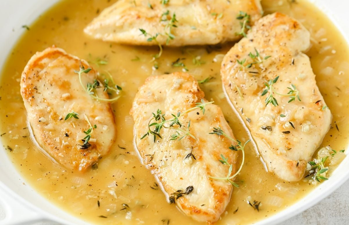 four chicken breasts in white wine sauce