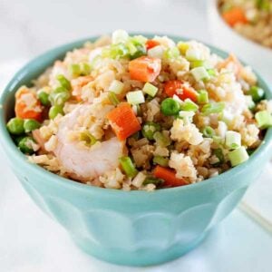 a small bowl of fried cauliflower rice with shrimp