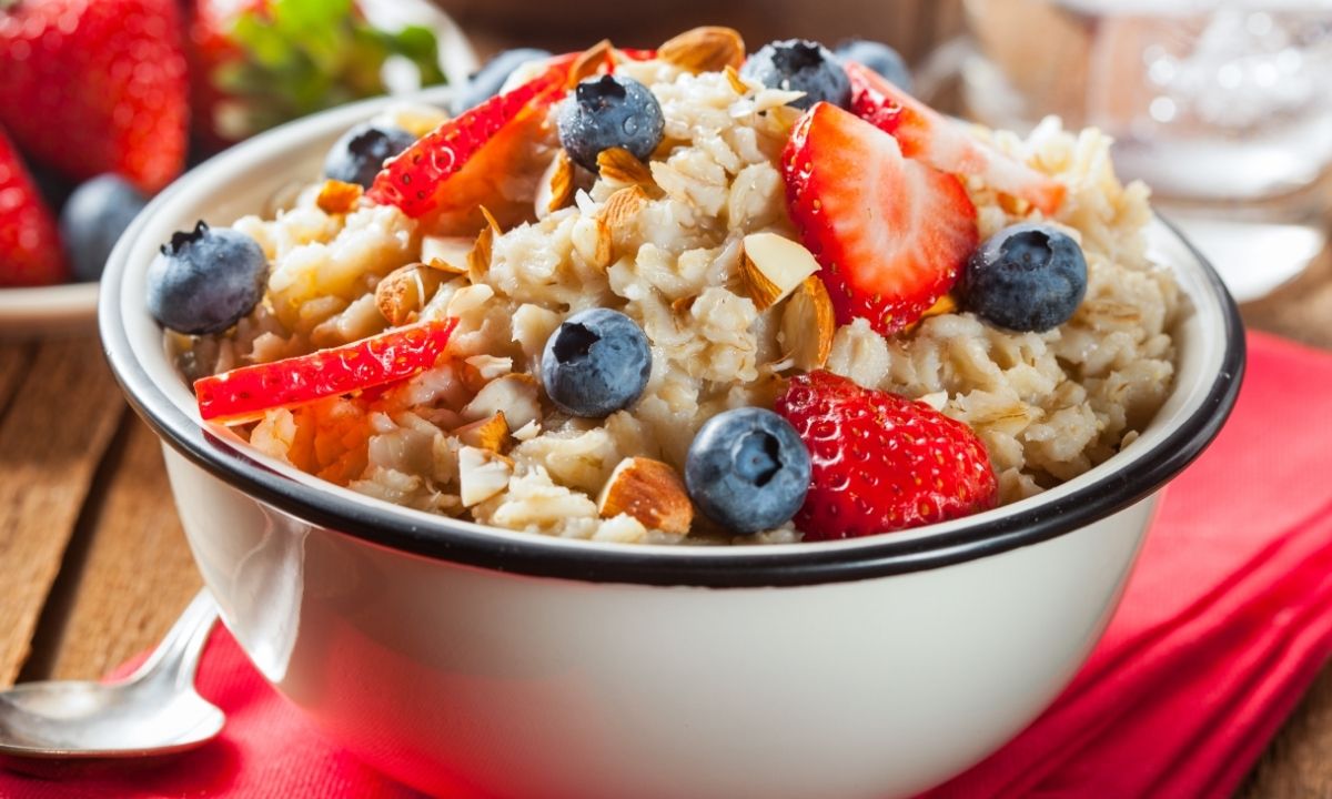 a bowl ot oatmeal topped with berries