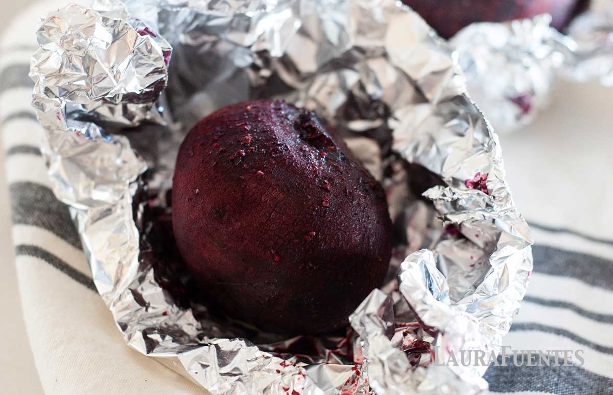 three whole roasted beets wrapped in foil