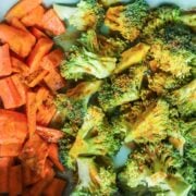 roasted broccoli and potatoes on a blue serving platter
