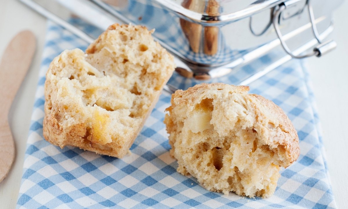 a cinnamon apple muffin cut in half