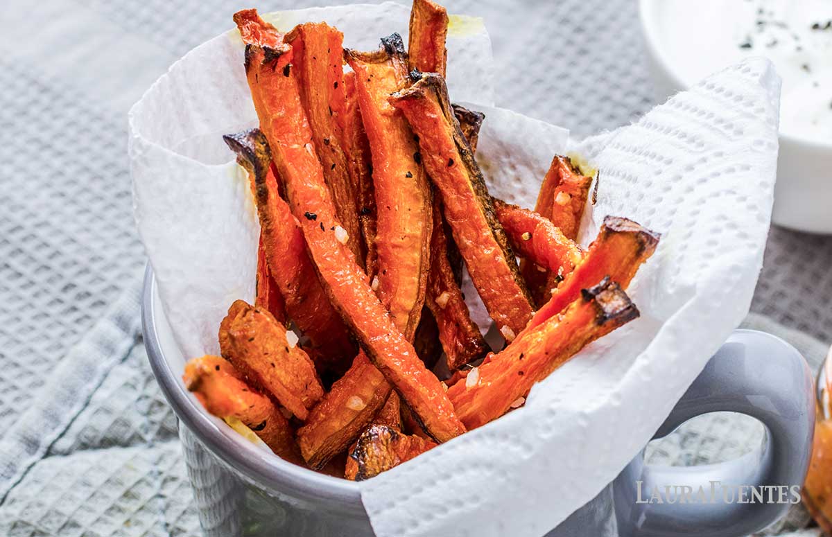 closeup of carrot fries in a serving cup