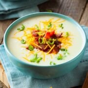 large blue bowl of potato soup
