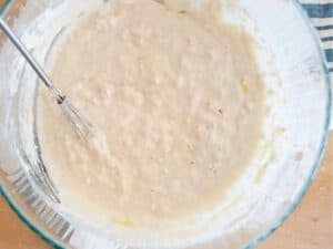 overhead view of pancake batter in a bowl to show texture