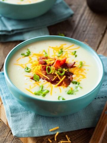 large blue bowl of potato soup