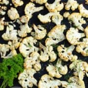 roasted cauliflower florets in a baking sheet