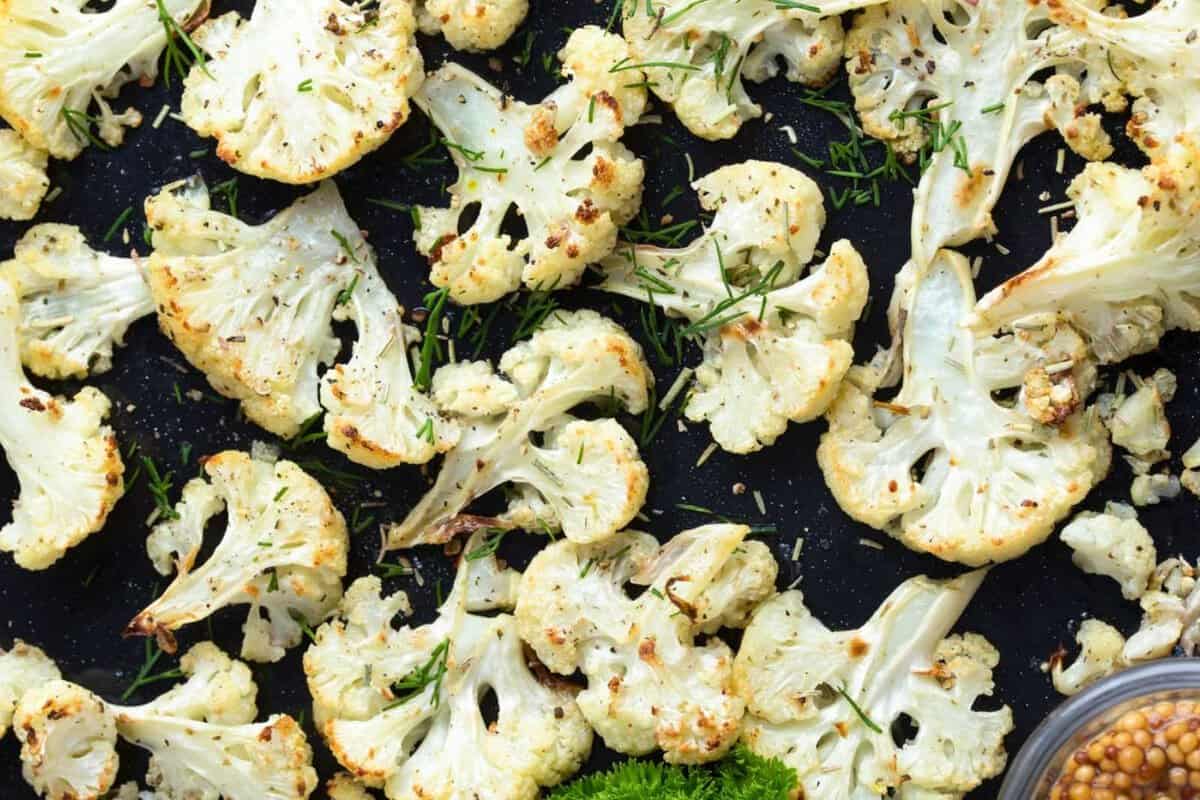 roasted cauliflower florets in a baking sheet