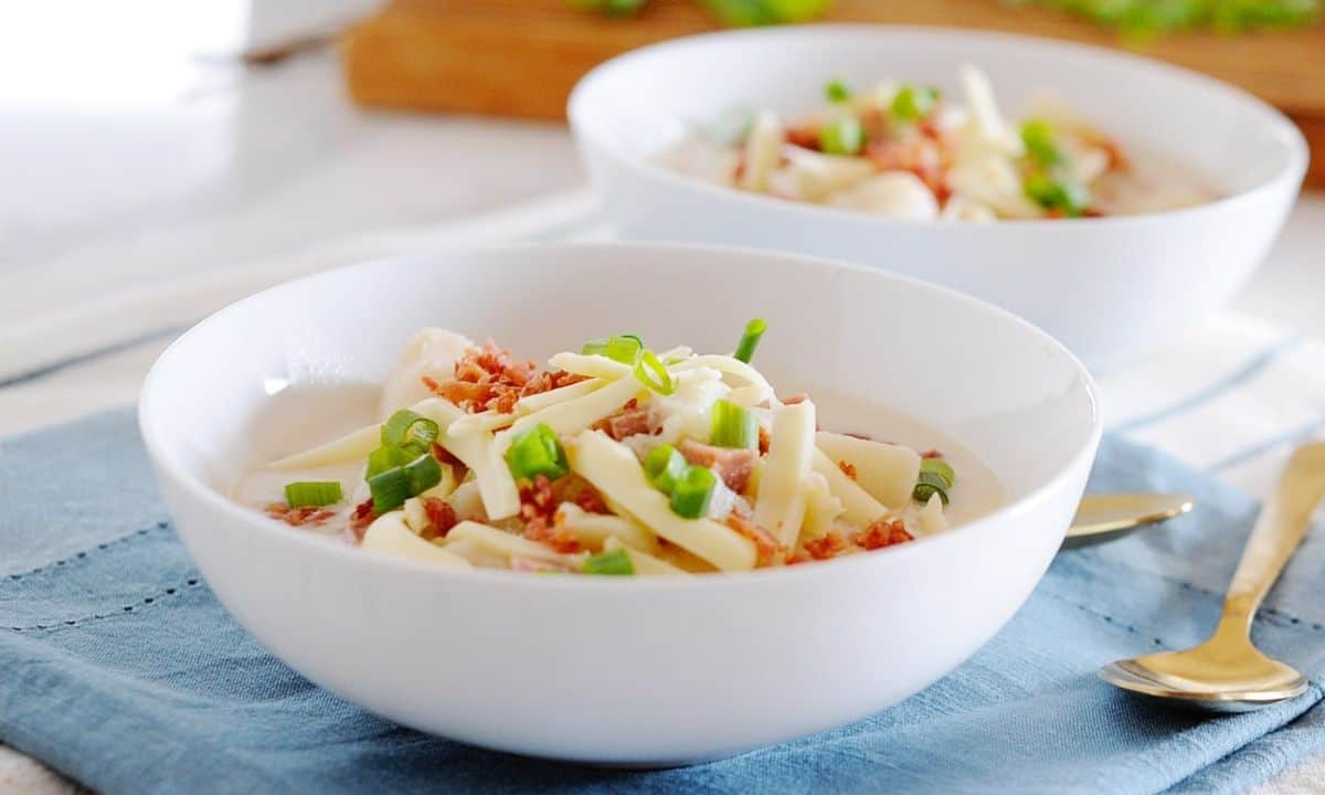two bowls of baked potato soup