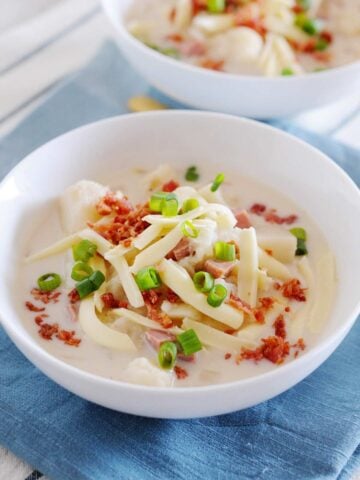 two bowls of baked potato soup