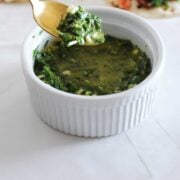a spoon and a bowl with cilantro chimichurri