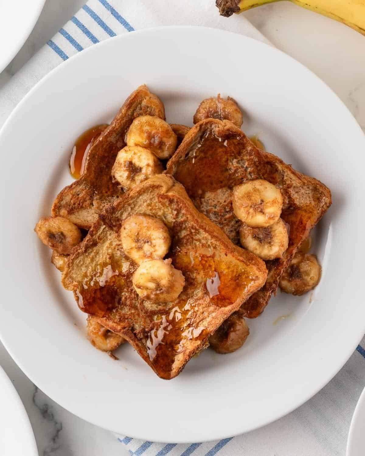 top view of banana french toast topped with banana slices