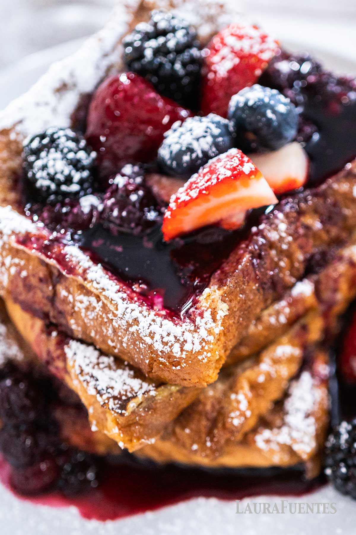closeup of French toast topped with berries