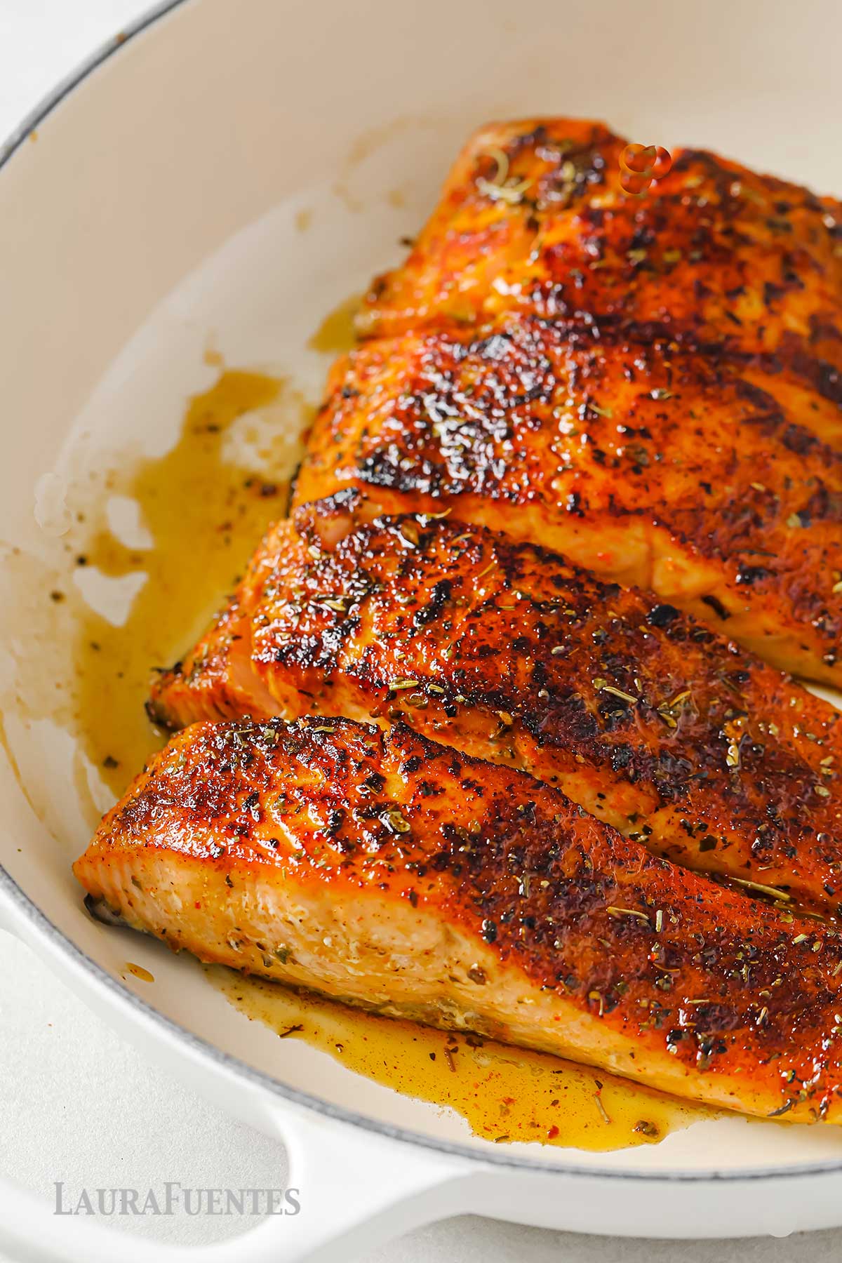 spicy salmon fillets in a pan