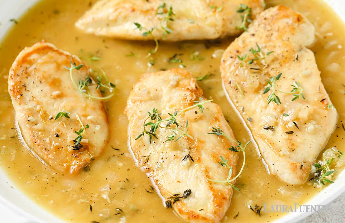 three chicken breasts with white wine sauce