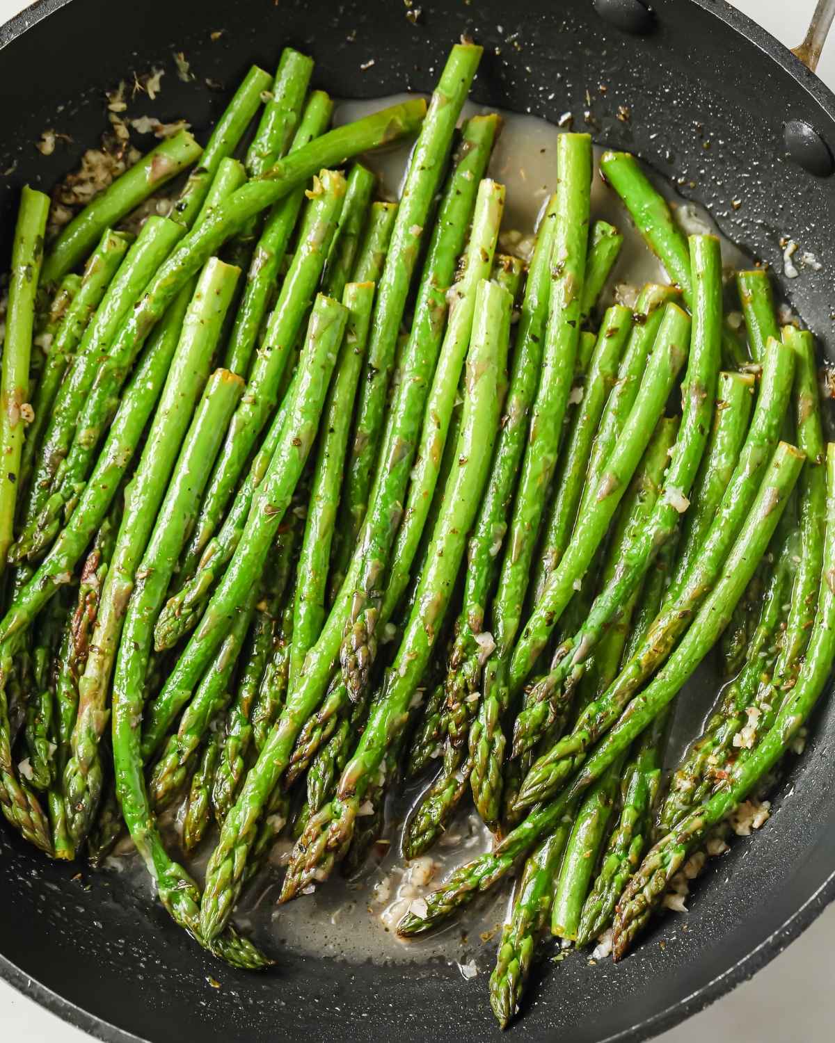 cooked asparagus in a pan