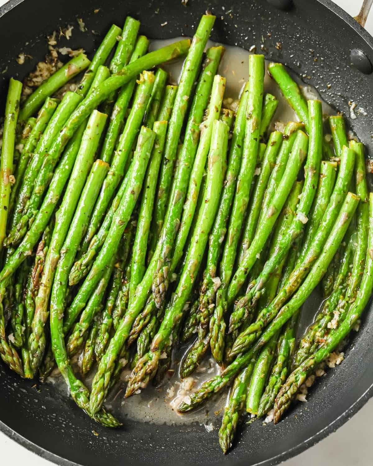 overhead view of asparagus in a pan