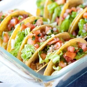 crispy tacos in a baking dish