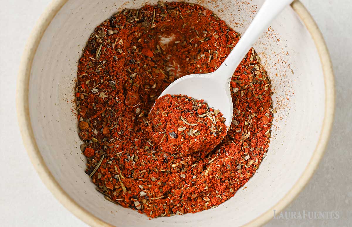 salmon seasoning in a bowl with a spoon