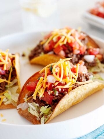 three hard shell tacos