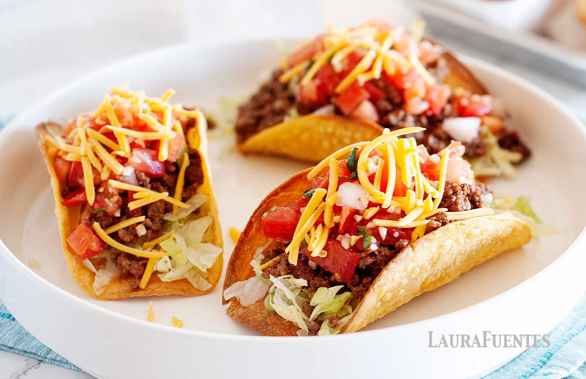 three hard shell tacos