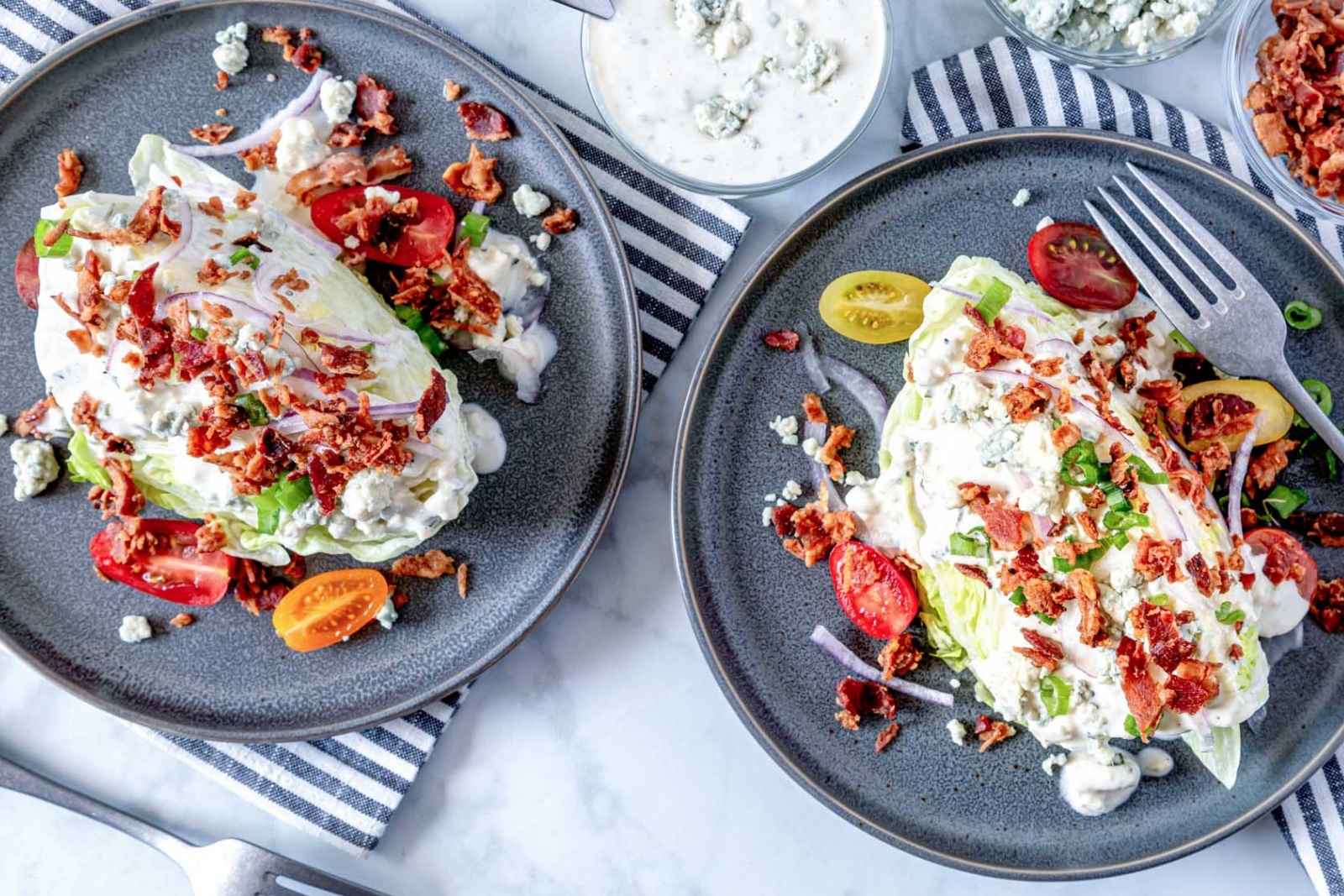top view of two gray dishes with wedge salad