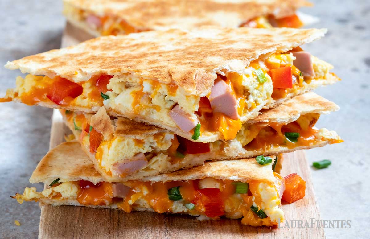 breakfast quesadillas with cheese, veggies and scrambled eggs