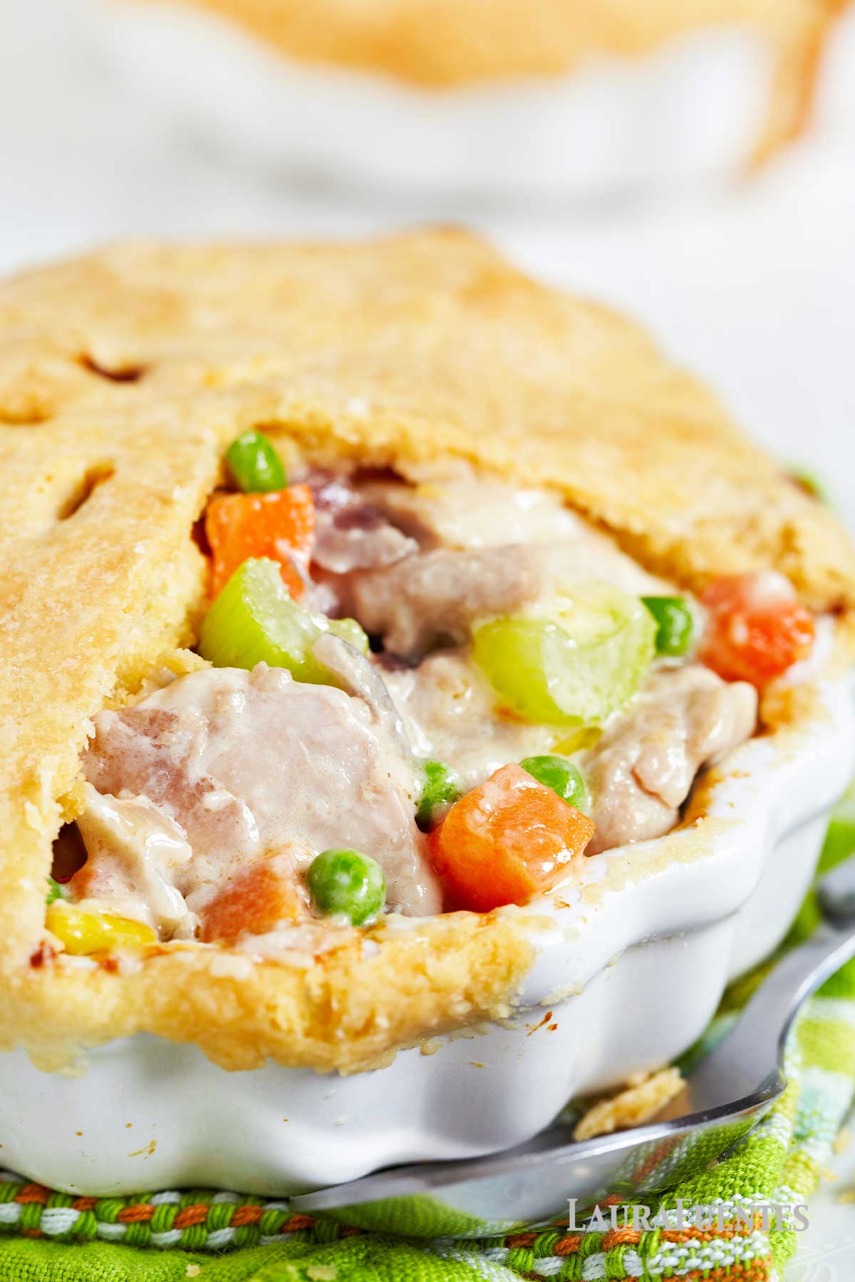 large gluten free chicken pot pie in a round pie dish