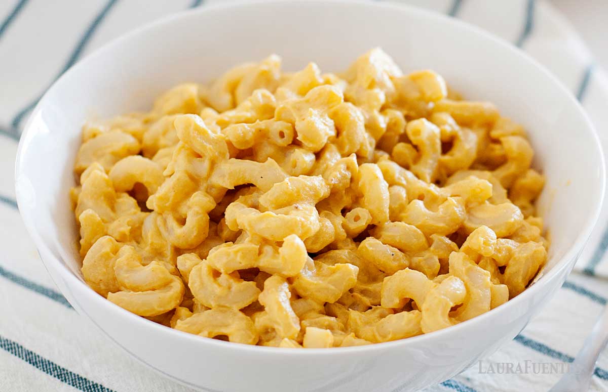 macaroni and cheese in a large white bowl