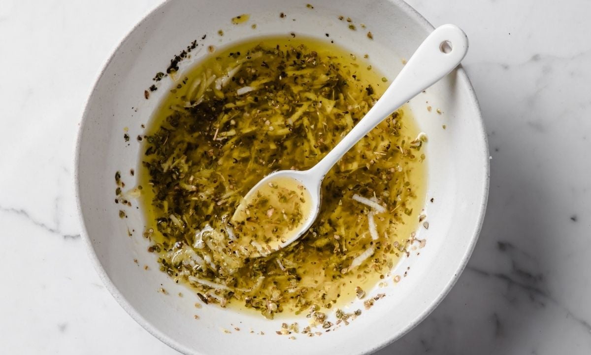 quick garlic lemon chicken marinade in a bowl