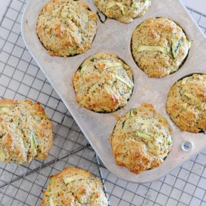 lemon zucchini muffins in a muffin tin