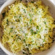 a bowl of parmesan garlic spaghetti squash