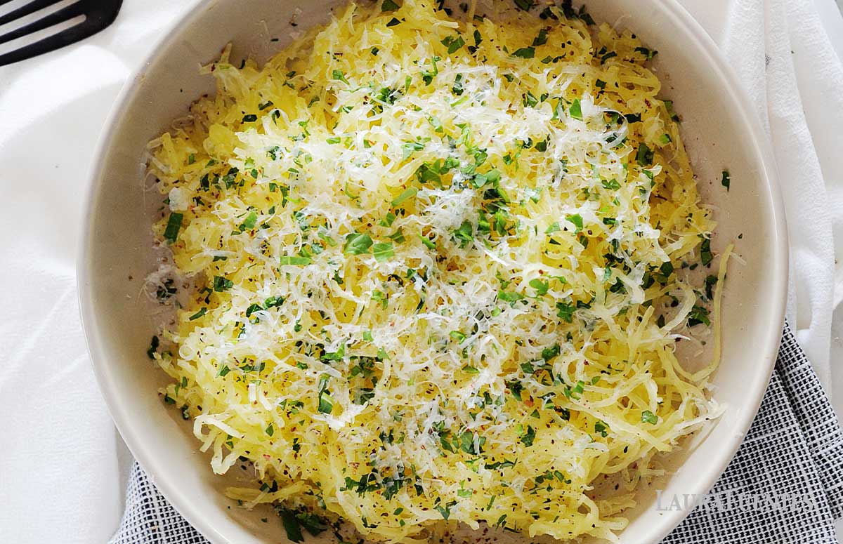 a bowl of parmesan garlic spaghetti squash