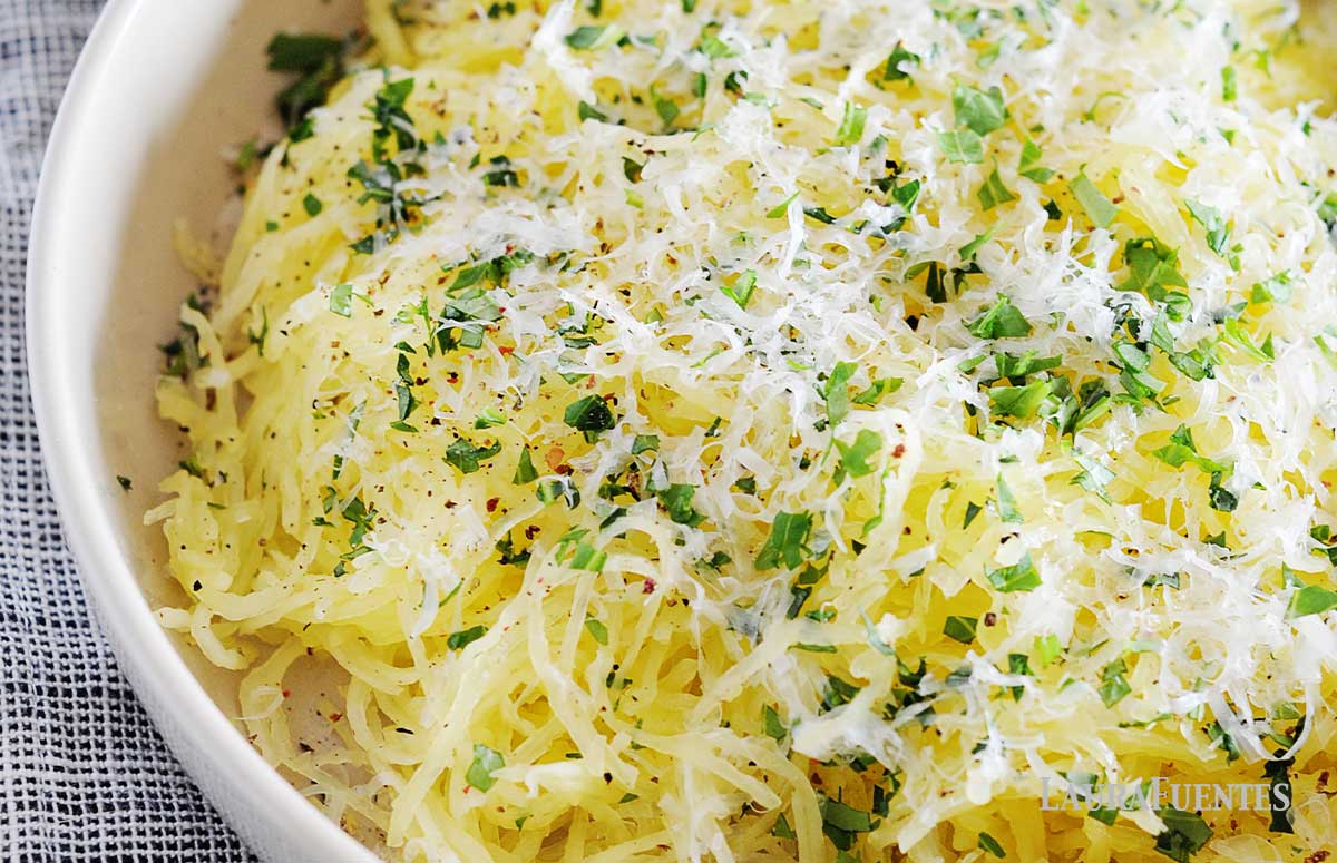 a bowl of garlic parmesan spaghetti squash