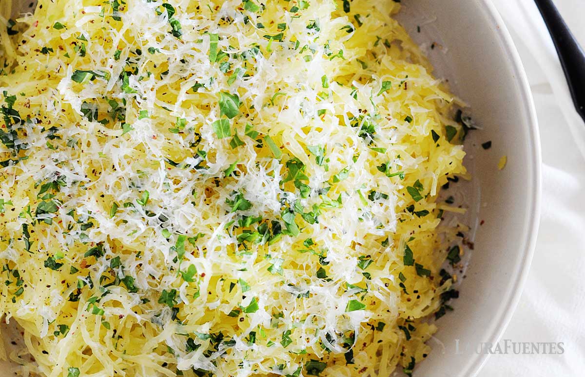 a bowl of parmesan garlic spaghetti squash