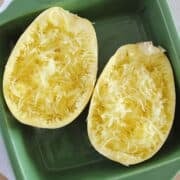 closeup of microwaved spaghetti squash in a green dish