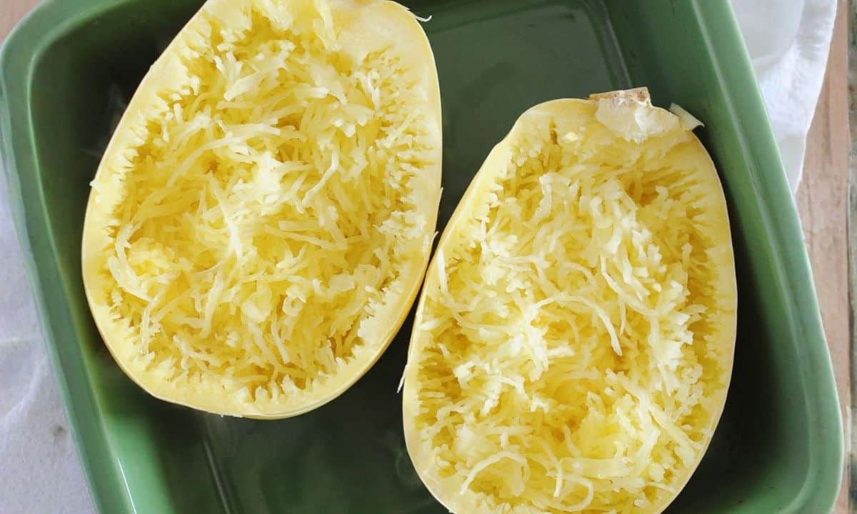 closeup of microwaved spaghetti squash in a green dish