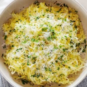 a bowl of parmesan garlic spaghetti squash