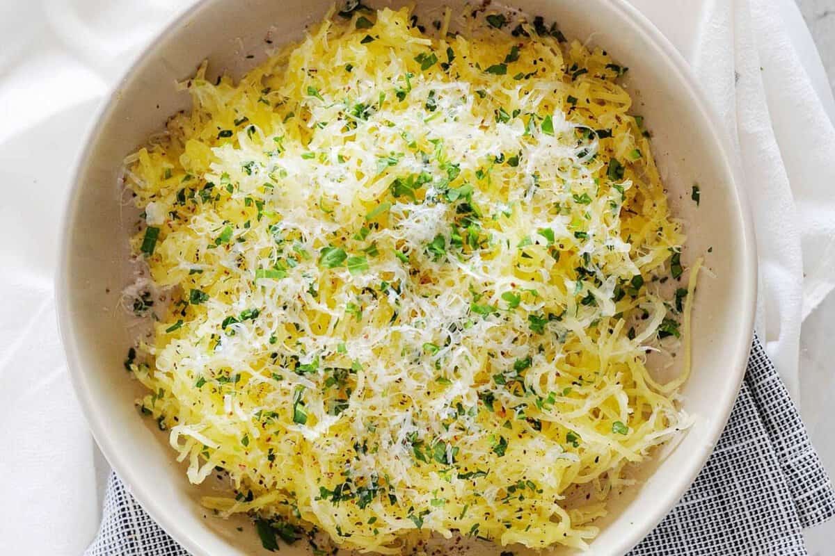a bowl of parmesan garlic spaghetti squash