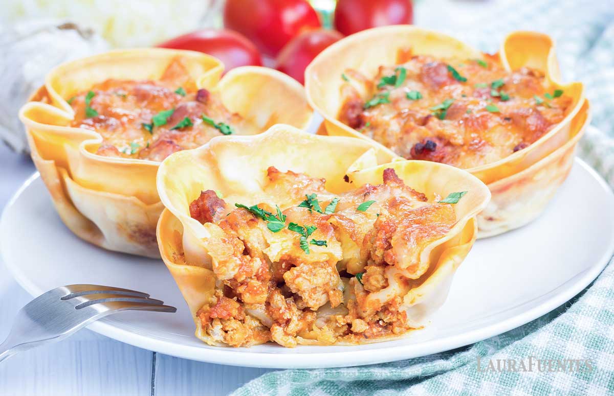 three lasagna cupcakes on a plate