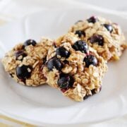 three blueberry breakfast cookies on a plate