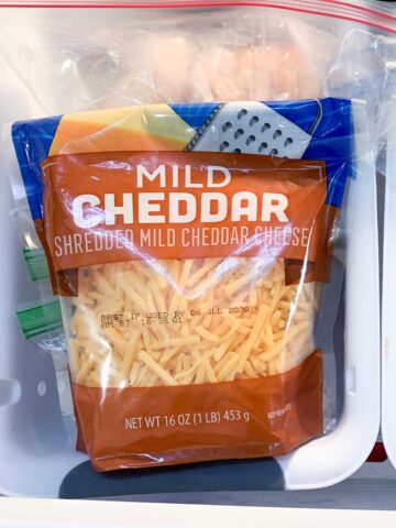 bag of shredded cheddar cheese in the freezer drawer