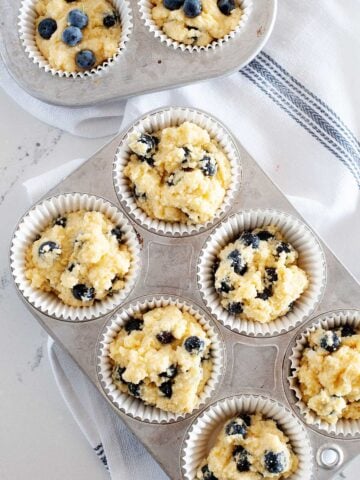 blueberry muffins in a muffin tin