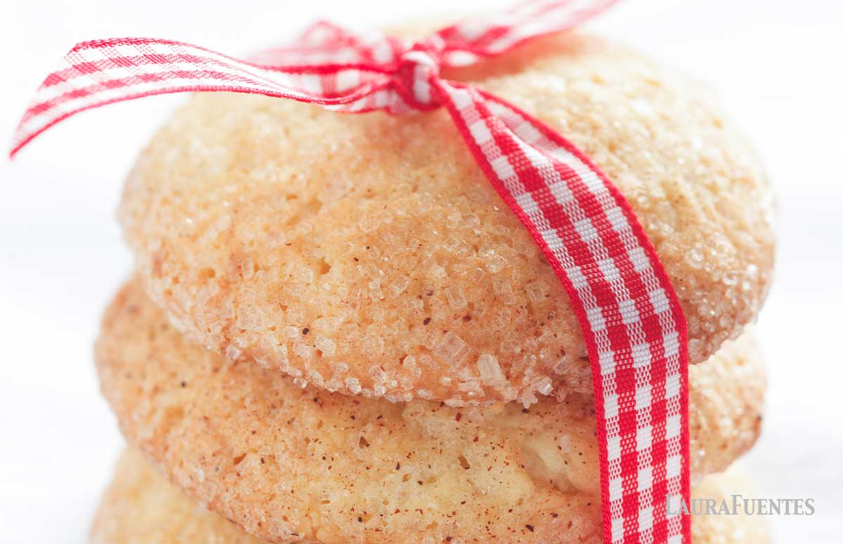 closeup of stack of cookies with a red bow